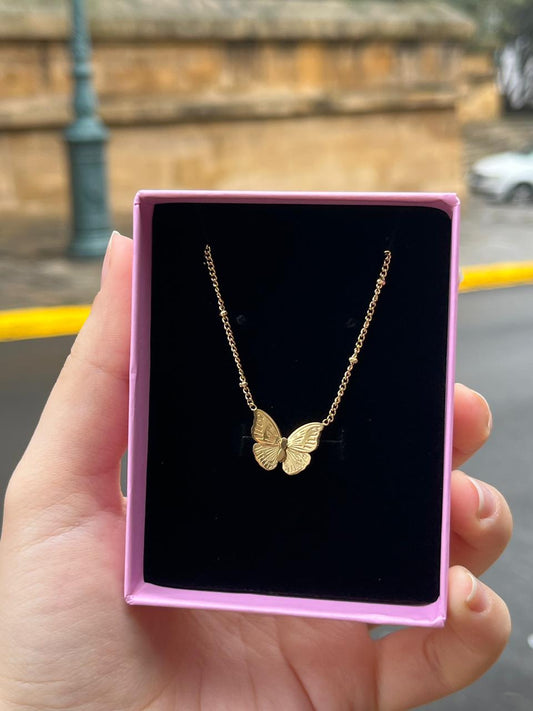 Collier Papillon Doré – Élégance & Féminité